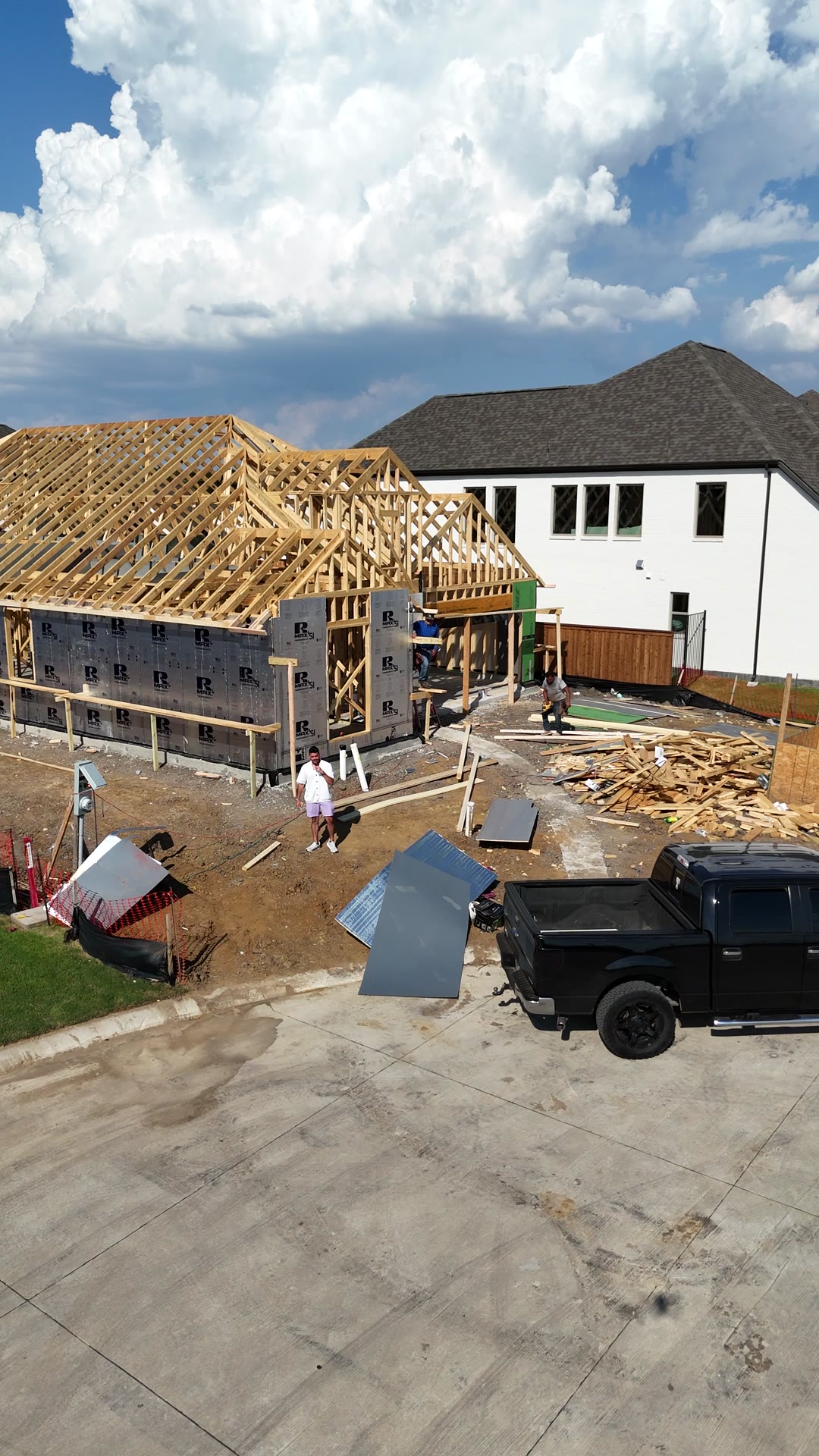 Drone view of the MTR Custom Homes build in Lakewood Village with the roof trusses up